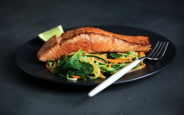 Salmon fillet with fresh greens